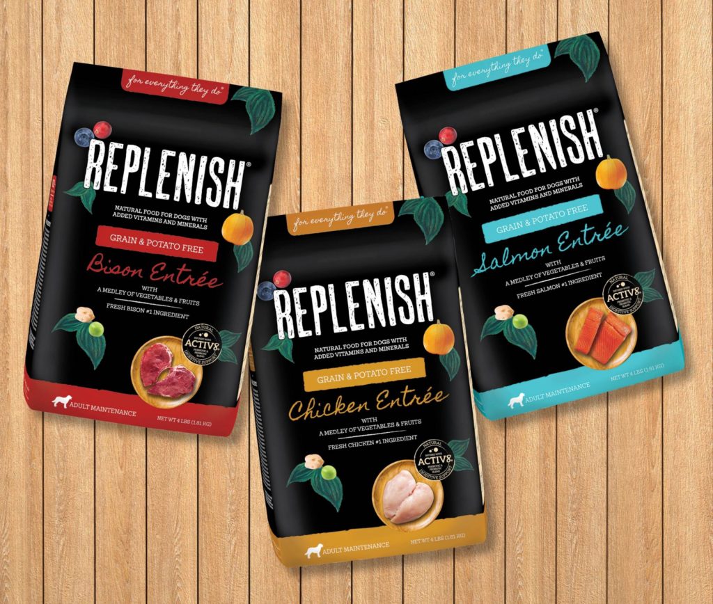 bold redesigned packaging three packages of wet dog food with red, yellow or aqua highlights on a black background